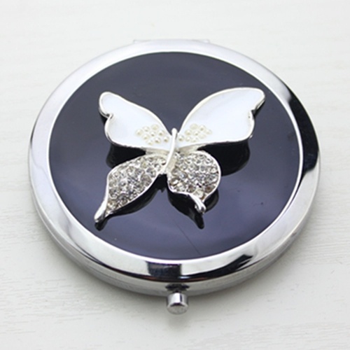 Butterfly metal compact mirror