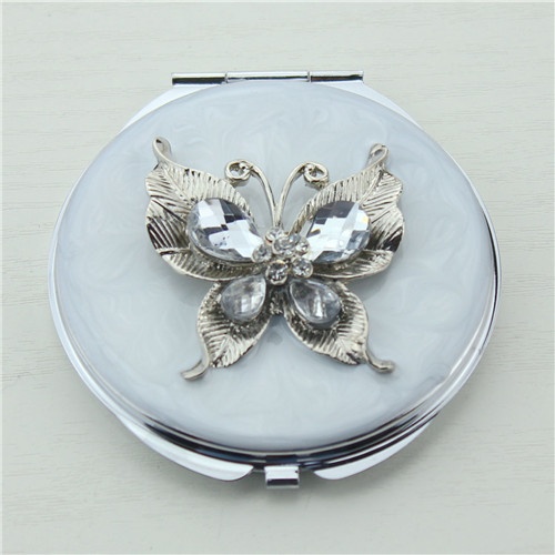 Butterfly style compact mirror