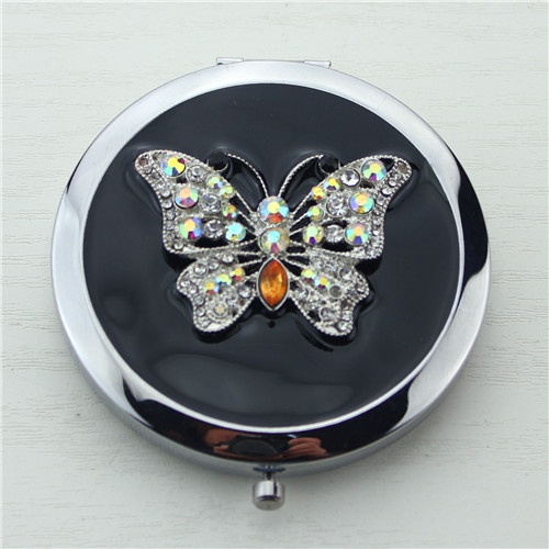 Flexible butterfly compact mirror