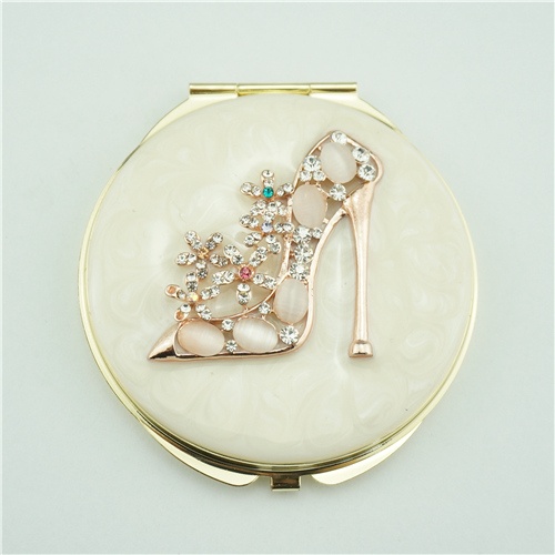 Crystal compact mirror favors