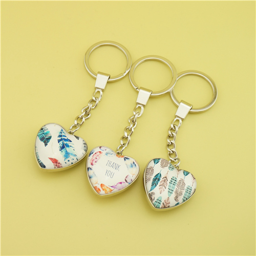 Heart-shaped Dome Glass Keychain - Feathers